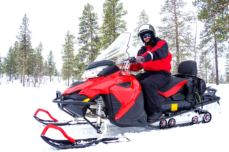 Snowmobile rider.